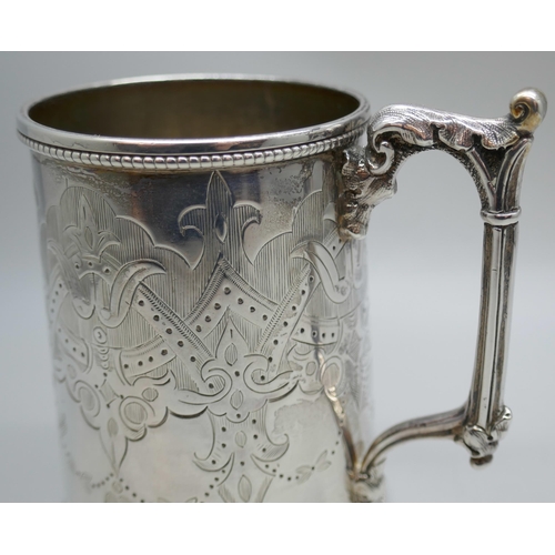 7313 - A Victorian silver mug with monogram and engraved detail, London 1866, 200g, 9.5cm