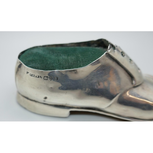 7322 - A silver pin cushion in the form of a shoe, Chester 1912, five inches, 81g total