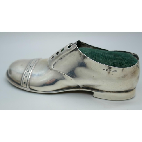 7322 - A silver pin cushion in the form of a shoe, Chester 1912, five inches, 81g total