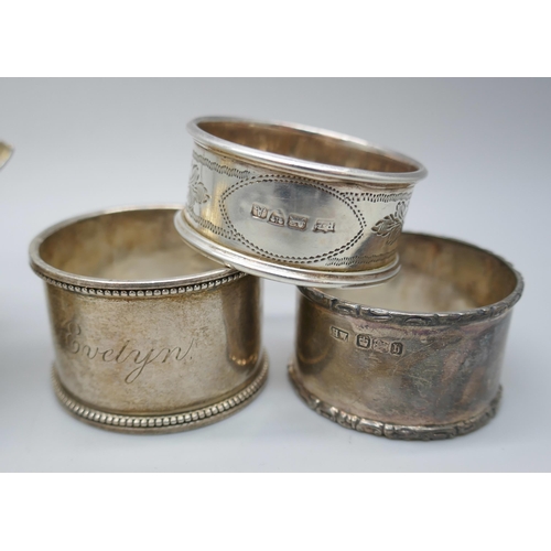 7323 - A pair of Victorian silver salts with matching spoons, and three silver napkin rings, 125g