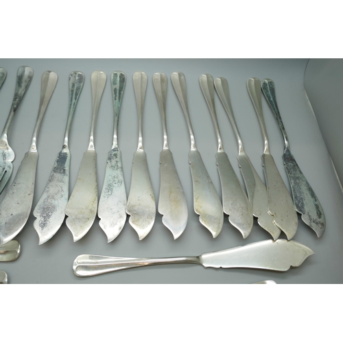 7330 - A set of twenty-four silver fish knives and forks, 12 + 12, Birmingham 1932, 1250g