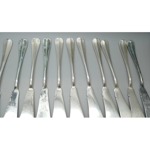 7330 - A set of twenty-four silver fish knives and forks, 12 + 12, Birmingham 1932, 1250g