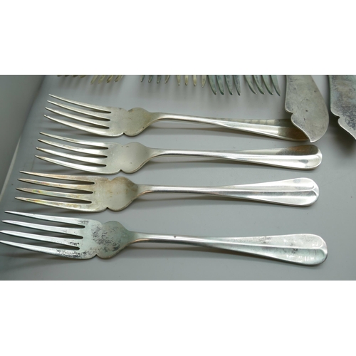 7330 - A set of twenty-four silver fish knives and forks, 12 + 12, Birmingham 1932, 1250g