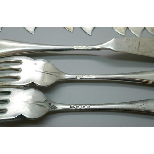 7330 - A set of twenty-four silver fish knives and forks, 12 + 12, Birmingham 1932, 1250g