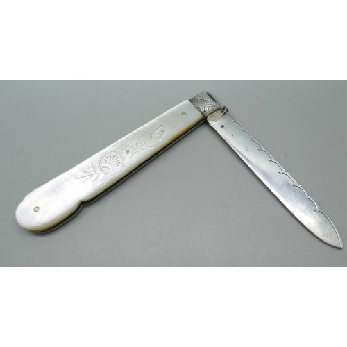 7334 - A silver bladed fruit knife with engraved decoration to  the mother of pearl handle and blade, Sheff... 