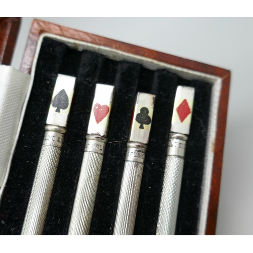 7339 - A set of four silver bridge pencils, 10cm, cased