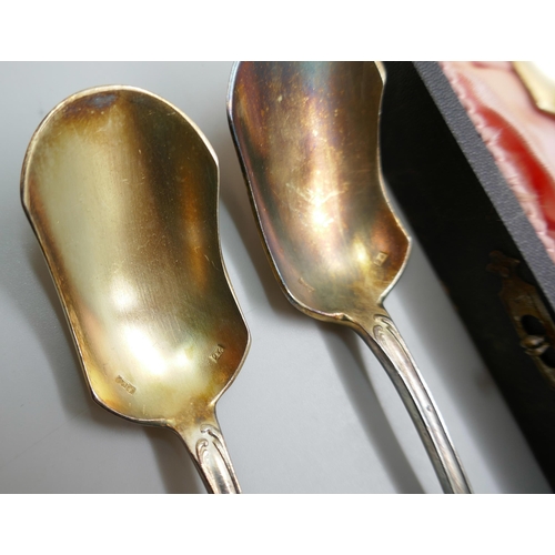 7341 - A cased set of white metal spoons with gilt bowls, continental control marks, 410g