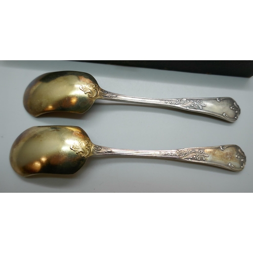 7341 - A cased set of white metal spoons with gilt bowls, continental control marks, 410g