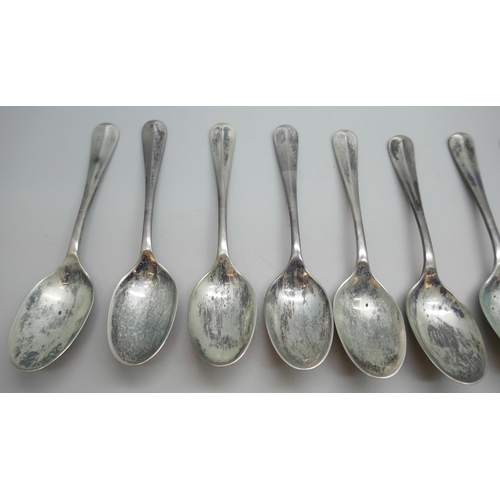 7344 - A set of twelve silver spoons, Birmingham 1933, 310g