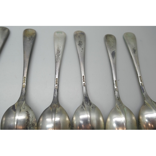 7344 - A set of twelve silver spoons, Birmingham 1933, 310g