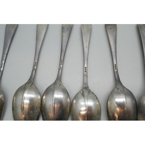 7344 - A set of twelve silver spoons, Birmingham 1933, 310g