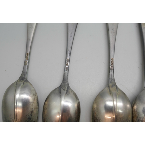 7344 - A set of twelve silver spoons, Birmingham 1933, 310g