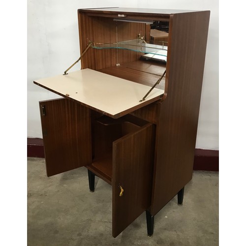 133 - A tola wood and black bureau