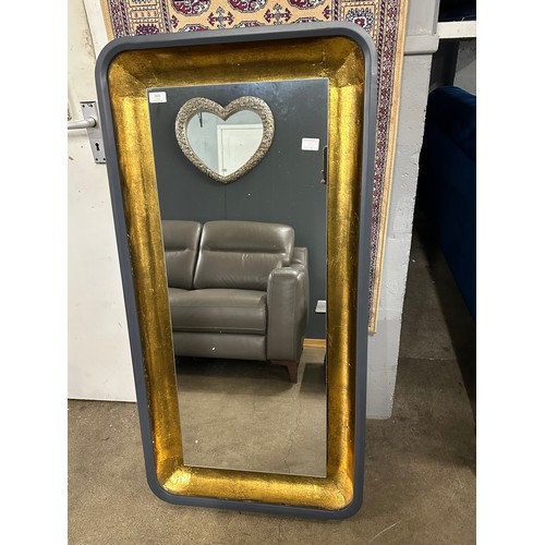 3131 - A black and gold framed mirror - ( No power supply)