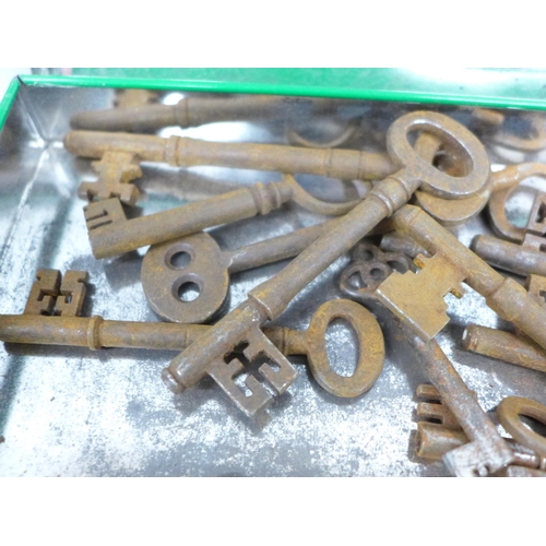 2034 - A collection of antique door keys