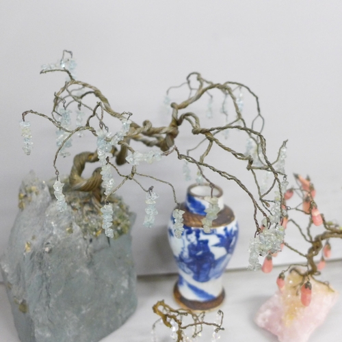 2058 - Three gem set trees and a Chinese blue and white vase