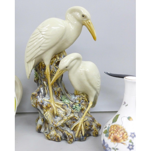 2061 - Four bird figures, Goebel golden oriole and silver gull, an early 20th Century swan and stork vase, ... 