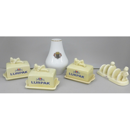 2064 - Three Lurpak advertising butter dishes and toast rack, and a German porcelain vase with Berlin crest