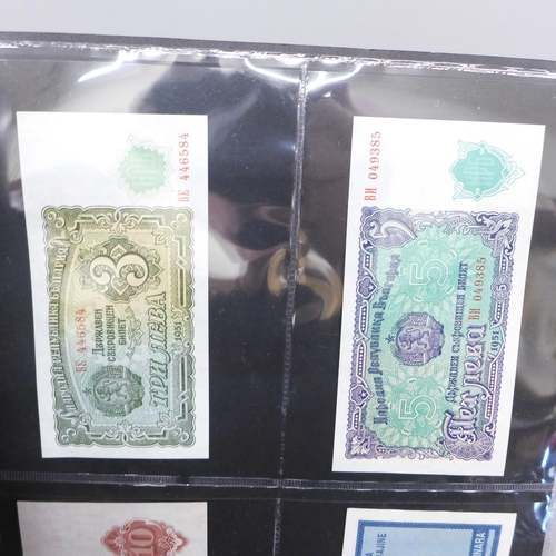 2070 - Bank notes; an album of 69 world bank notes