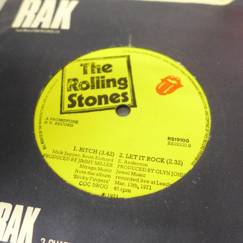 2082 - A collection of 45rpm records, Elvis, Rolling Stones and The Beatles, cased, 45 in total