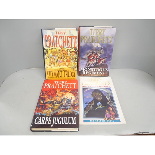 2144 - Three first edition hardback books by Terry Pratchett 'Carpe Jugulum', 'Monstrous Regiment', 'City W... 