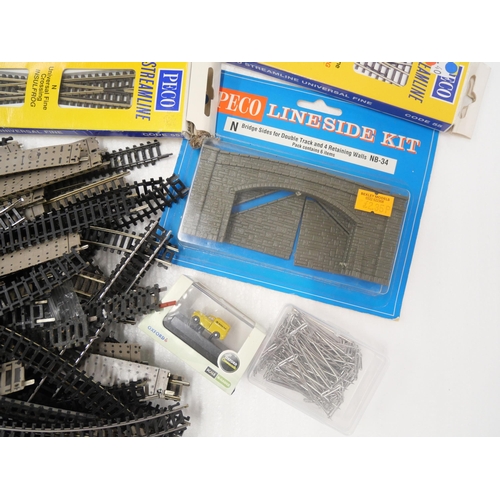 2160 - A box of N gauge track and accessories including Peco