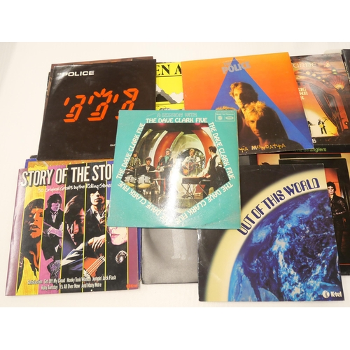 2161 - A collection of 35 LP records, mainly rock including Skid Row, Queen, Status Quo, Thin Lizzy, The St... 