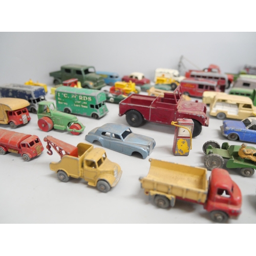 2167 - A box of loose metal Matchbox model vehicles dating from 1950's