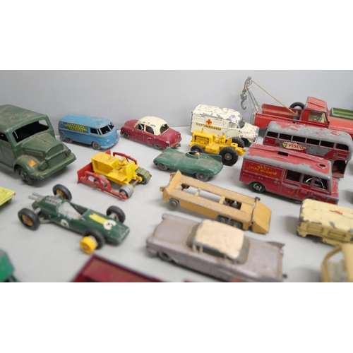 2167 - A box of loose metal Matchbox model vehicles dating from 1950's