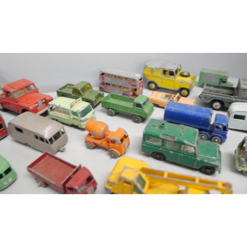 2167 - A box of loose metal Matchbox model vehicles dating from 1950's