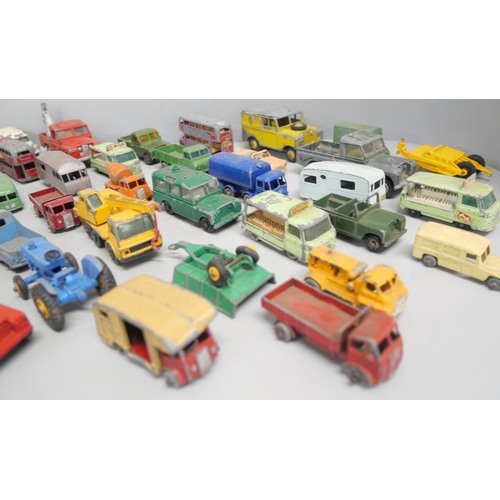 2167 - A box of loose metal Matchbox model vehicles dating from 1950's