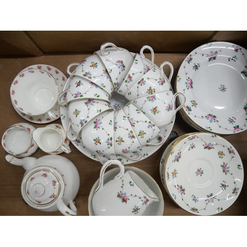 2176 - A box of bone china Crown Staffordshire tea wares decorated with swags of flowers. Comprising of 10 ... 