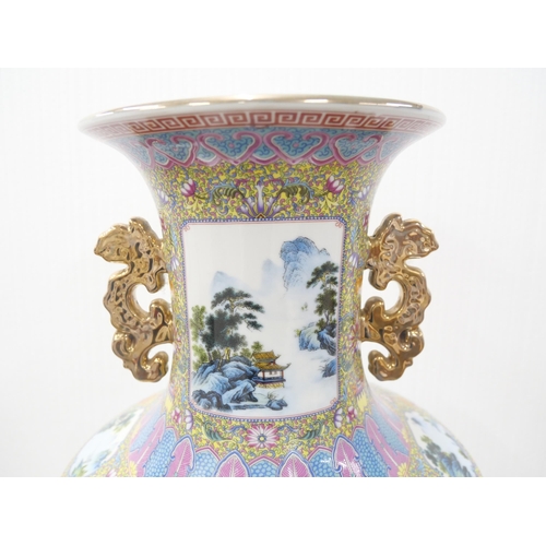 2179 - A large Chinese Qung Yongzheng vase with famille rose pattern and landscape scene to body. Stamped t... 