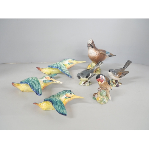 2189 - A collection of Beswick bird figures includes a goldfinch, whitethroat, grey wagtail, jay bird and a... 