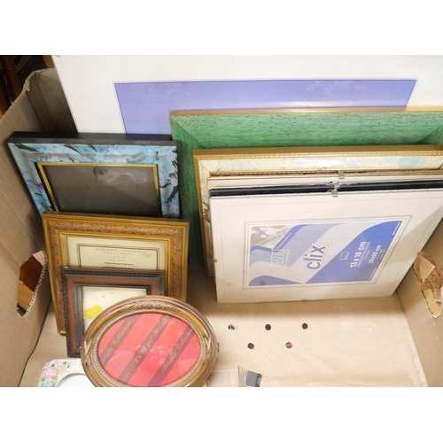 2216 - A box of photograph and picture frames of varying sizes made of wood, metal, glass, approximately 35... 