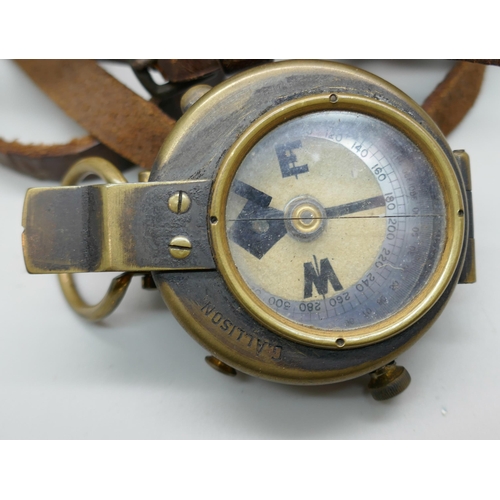 2227 - An early 20th century brass compass, stamped G. Allison, with leather case