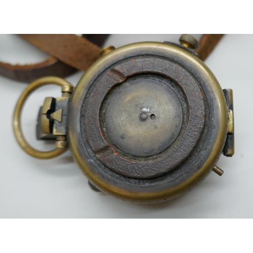 2227 - An early 20th century brass compass, stamped G. Allison, with leather case