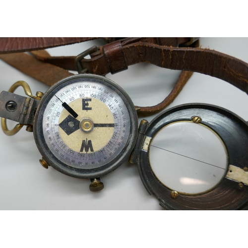 2227 - An early 20th century brass compass, stamped G. Allison, with leather case