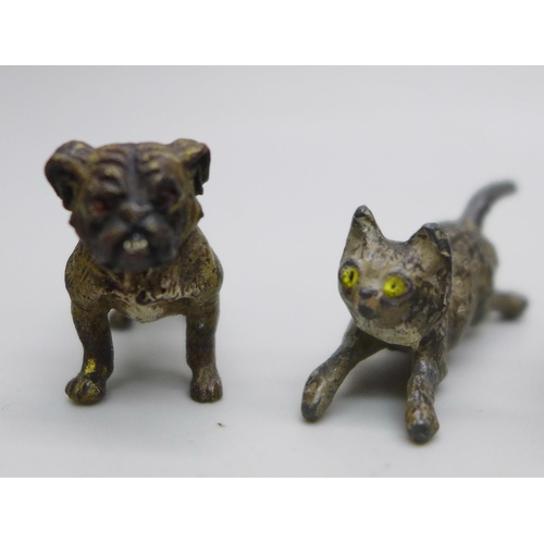 2229 - Eleven miniature cold painted bronze and spelter animal figures, including four dogs and three cats,... 