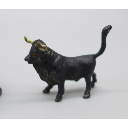 2229 - Eleven miniature cold painted bronze and spelter animal figures, including four dogs and three cats,... 