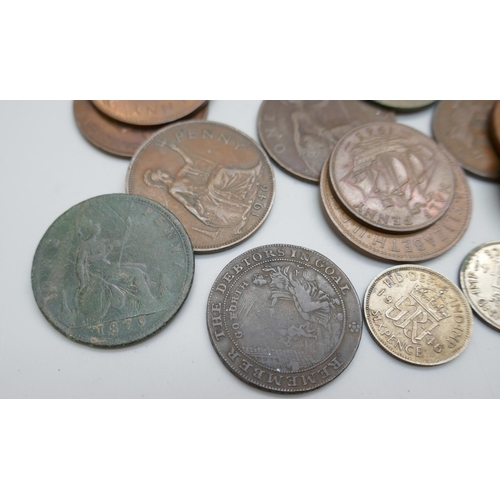 2233 - A small collection of coins, two silver sixpences, pennies, half-pennies and a John Howard Debtors I... 