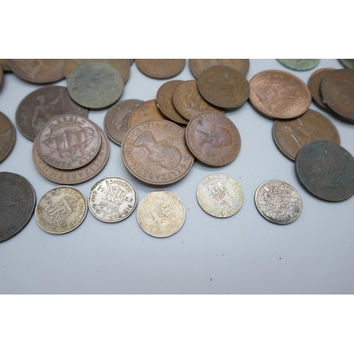 2233 - A small collection of coins, two silver sixpences, pennies, half-pennies and a John Howard Debtors I... 