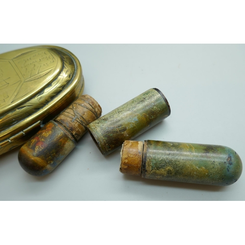 2234 - A large brass tobacco box, 12.5cm, a leather mounted glass flask holder and a cylindrical case