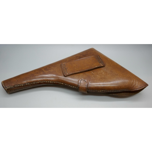 2241 - A leather holster for a pistol, 26cm