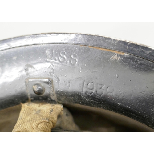 2246 - A British World War II Wardens helmet and an enamelled ARP Air Raid Warden plaque, plaque 77mm x 229... 