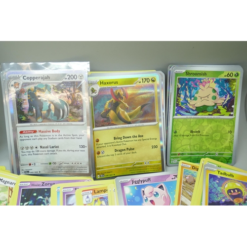 2250 - A large collection of Pokémon cards with holographic in collectors tin, no energy cards