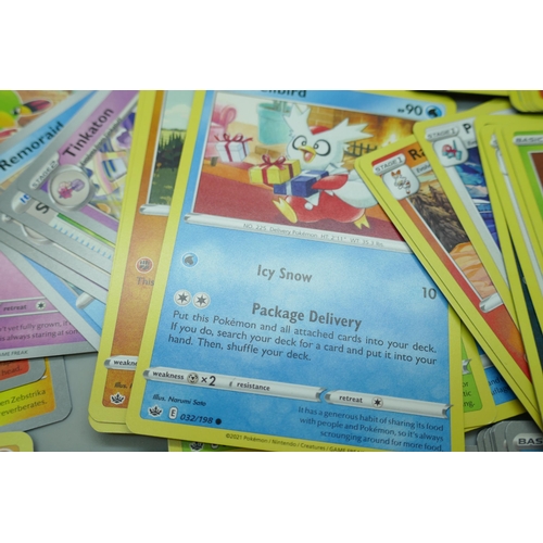 2250 - A large collection of Pokémon cards with holographic in collectors tin, no energy cards