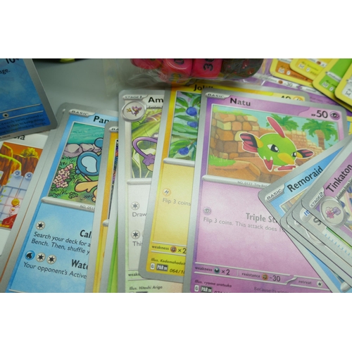 2250 - A large collection of Pokémon cards with holographic in collectors tin, no energy cards