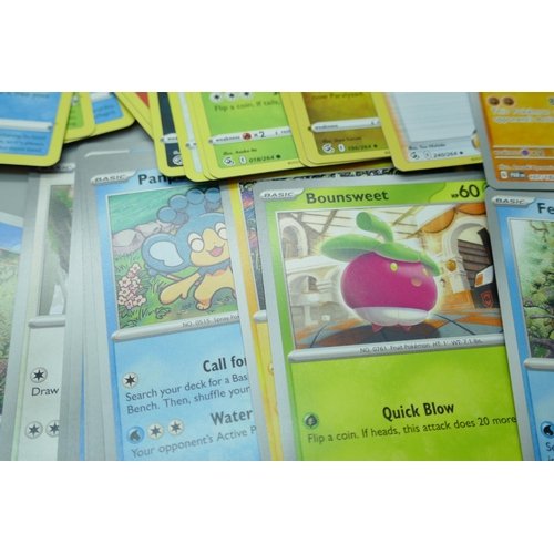 2250 - A large collection of Pokémon cards with holographic in collectors tin, no energy cards