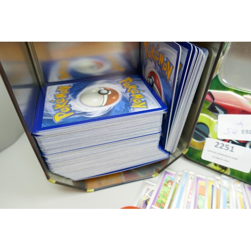 2251 - A large collection of Pokémon cards with holographic in collectors tin, no energy cards